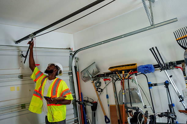 Professional Garage Door Panel Replacement technician working in Mastic Beach, NY